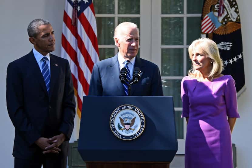  Vice President Joe Biden, flanked by his wife Jill Biden and President Obama, announces...