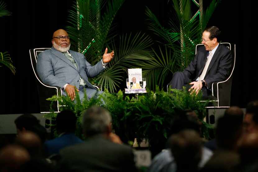 Bishop T.D. Jakes (left) and AT&T Chairman and CEO Randall Stephenson talk about how they're...