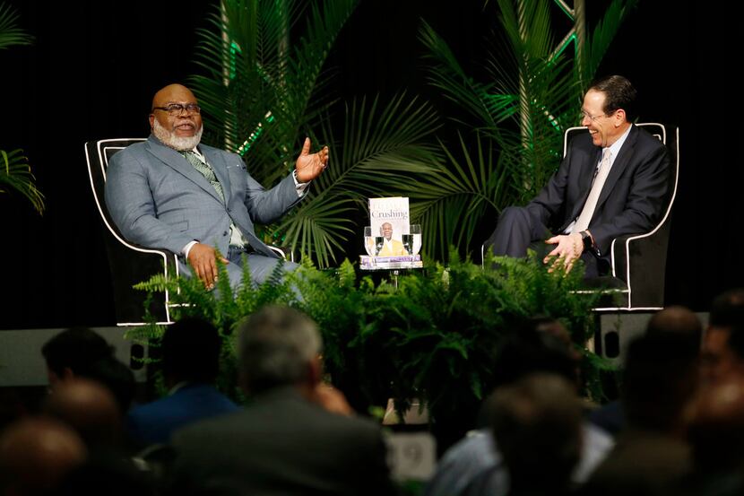 Bishop T.D. Jakes (left) and AT&T Chairman and CEO Randall Stephenson talk about how they're...