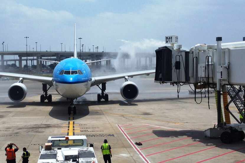  A KLM jet is welcomed to Dallas/Fort Worth International Airport in this May 2013 photo....
