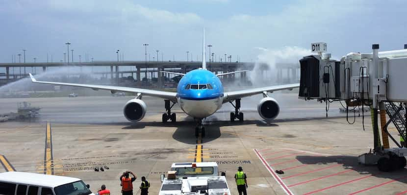  A KLM jet is welcomed to Dallas/Fort Worth International Airport in this May 2013 photo....