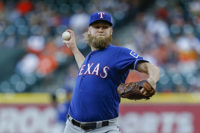 HOUSTON, TX - MAY 01:  Andrew Cashner #54 of the Texas Rangers pitches in the first inning...