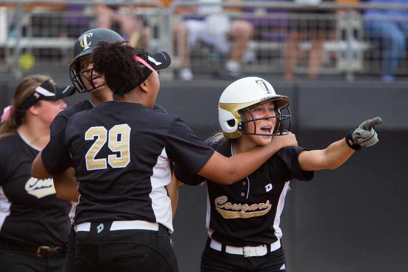(Left to right)Jayda Coleman, Karlie Charles, and Jacee Hamlin celebrate after scoring two...