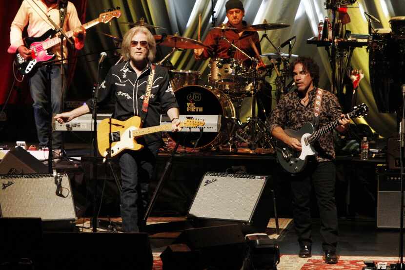 Hall & Oates, starring Daryl Hall (front left) and John Oates (front right), perform at the...