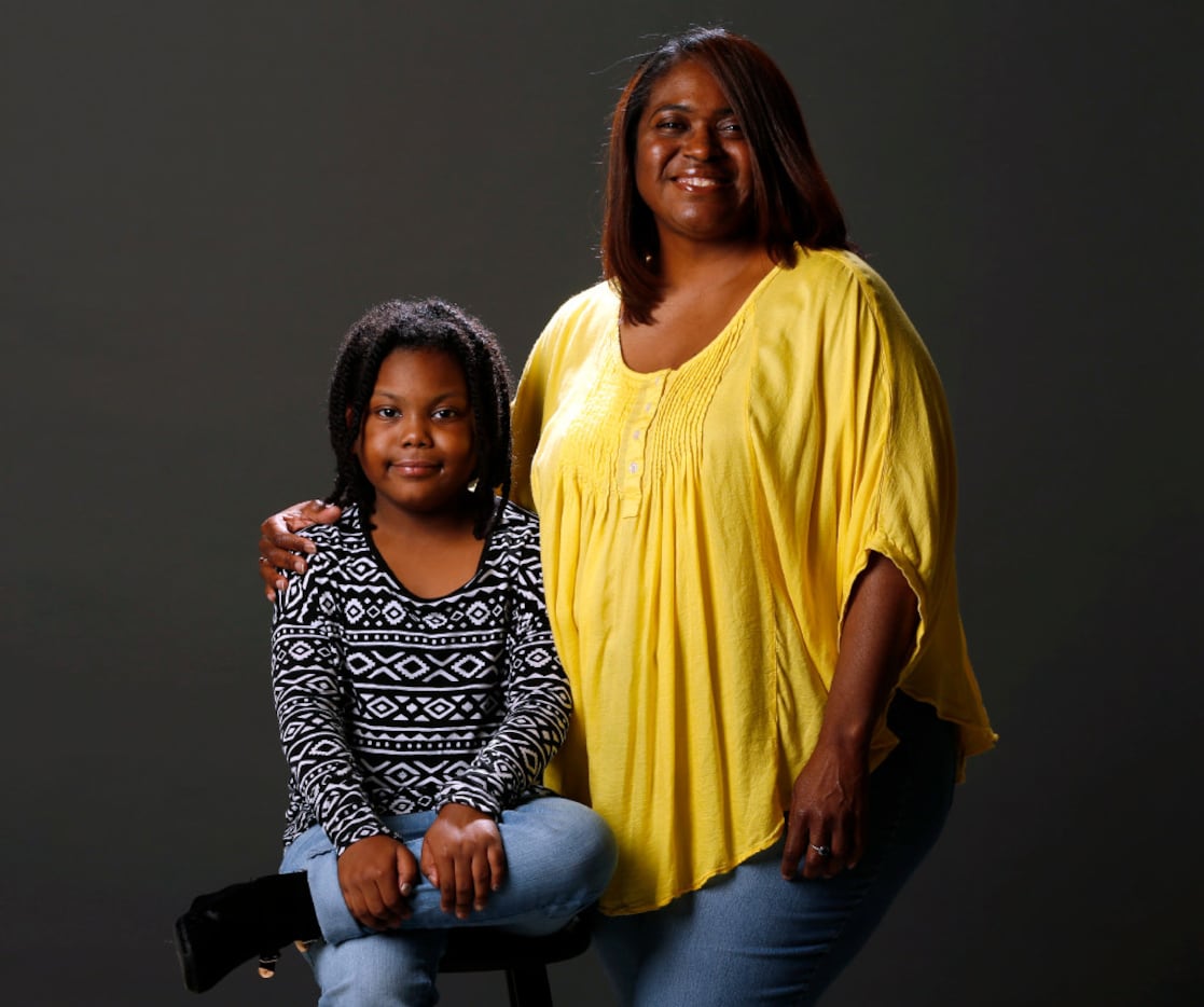 Dawn Burkes and her daughter Faith Barnette pose for a photo in the studio at "The Dallas...