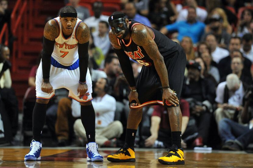 Feb 27, 2014; Miami, FL, USA; New York Knicks small forward Carmelo Anthony (7) and Miami...