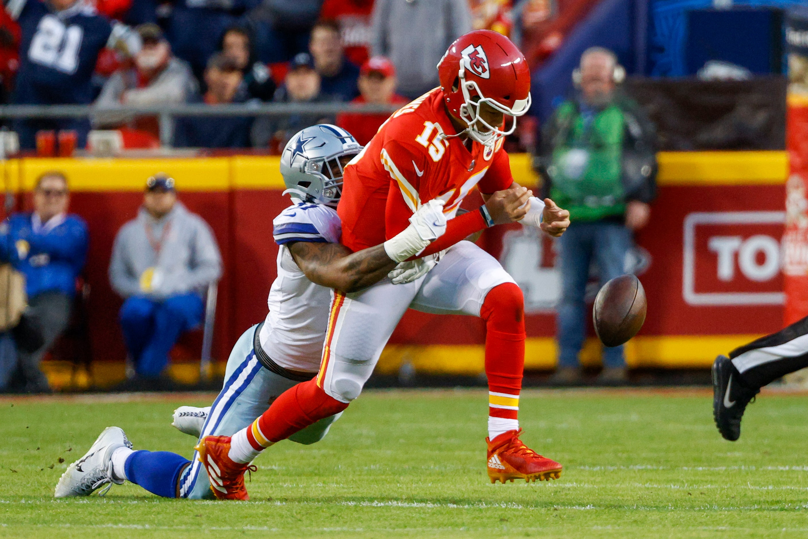 Dallas Cowboys outside linebacker Micah Parsons (11) tackles and forces a fumble from Kansas...