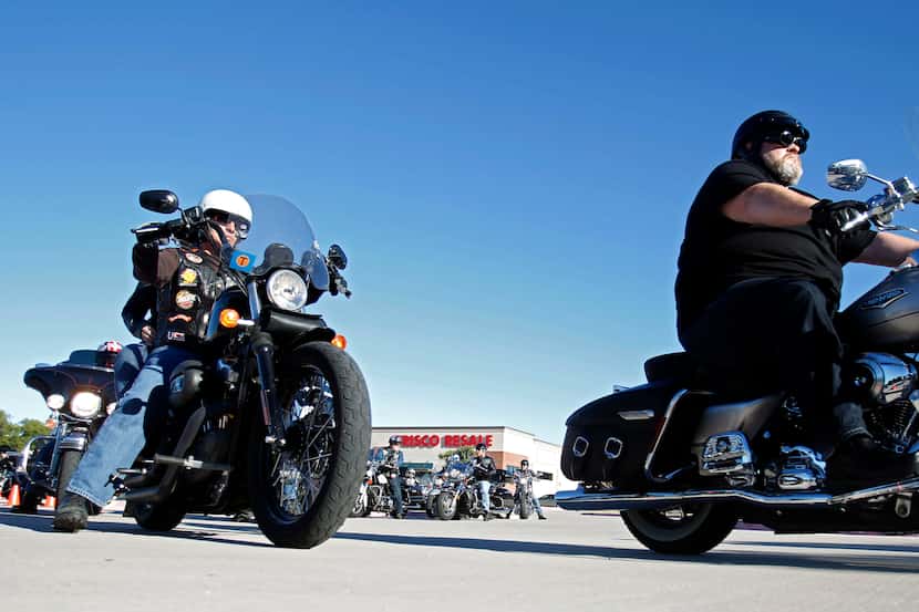 Bikers make their way out of the Frisco Resale parking lot at the Riding 4 Meals Motorcycle...