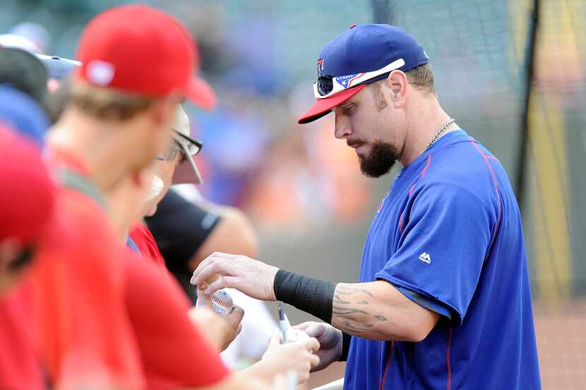 BALTIMORE, MD - JUNE 29: Josh Hamilton #32 of the Texas Rangers signs autographs before the...