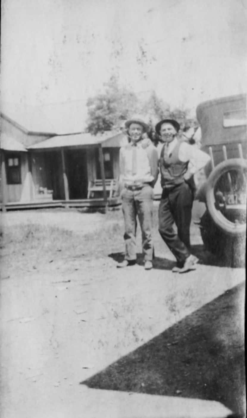 Victor Clifford Bilbo (left) posed with a driver and a motorcar from the old Bilbo Jitney Line.