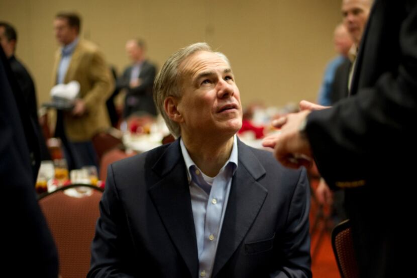 Texas Attorney General Greg Abbott met visitors Saturday during the Texas State Rifle...