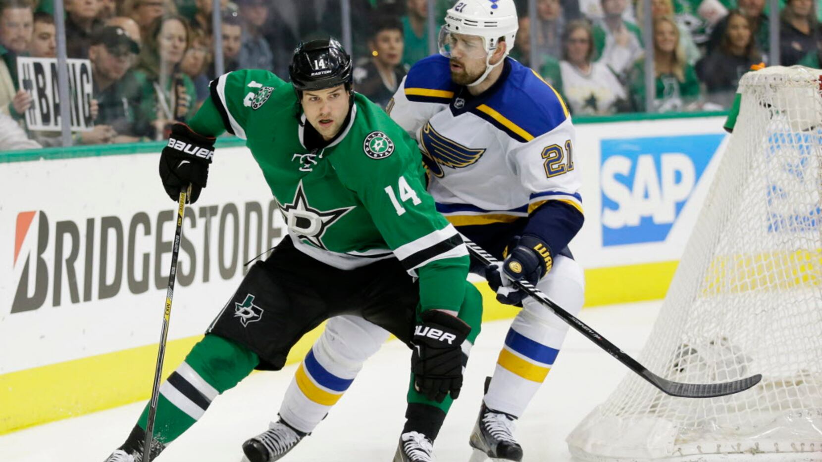 Dallas Stars left wing Jamie Benn (14) skates with the puck against St. Louis Blues center...