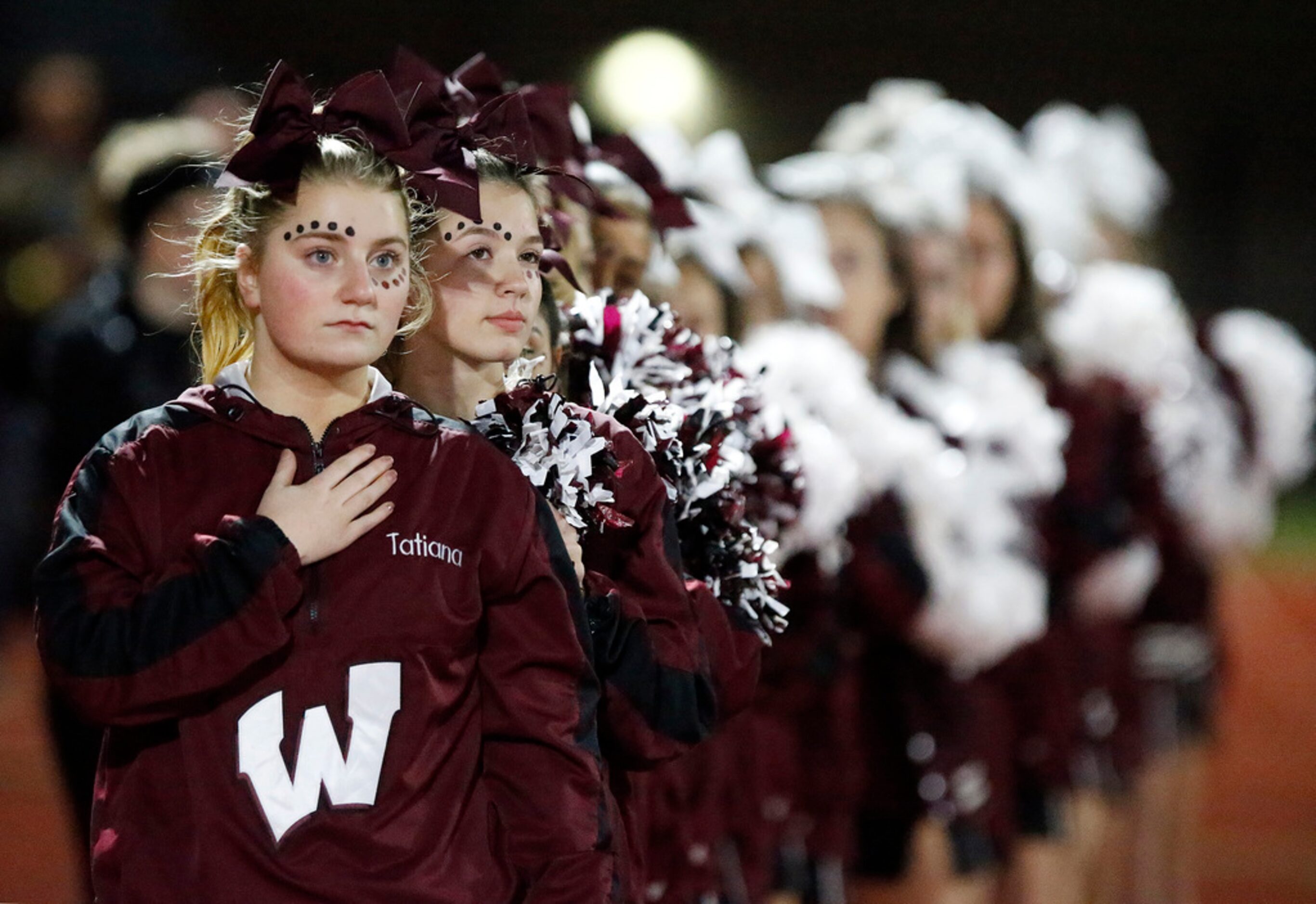 Wylie cheerleader Tatiana Novello, 16, stands in front of fellow cheerleader Jenna Owen, 15,...