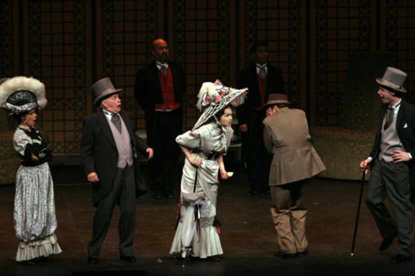 Kimberly Whalen as Eliza Doolittle (center) in the Lyric Stage presentation of "My Fair...