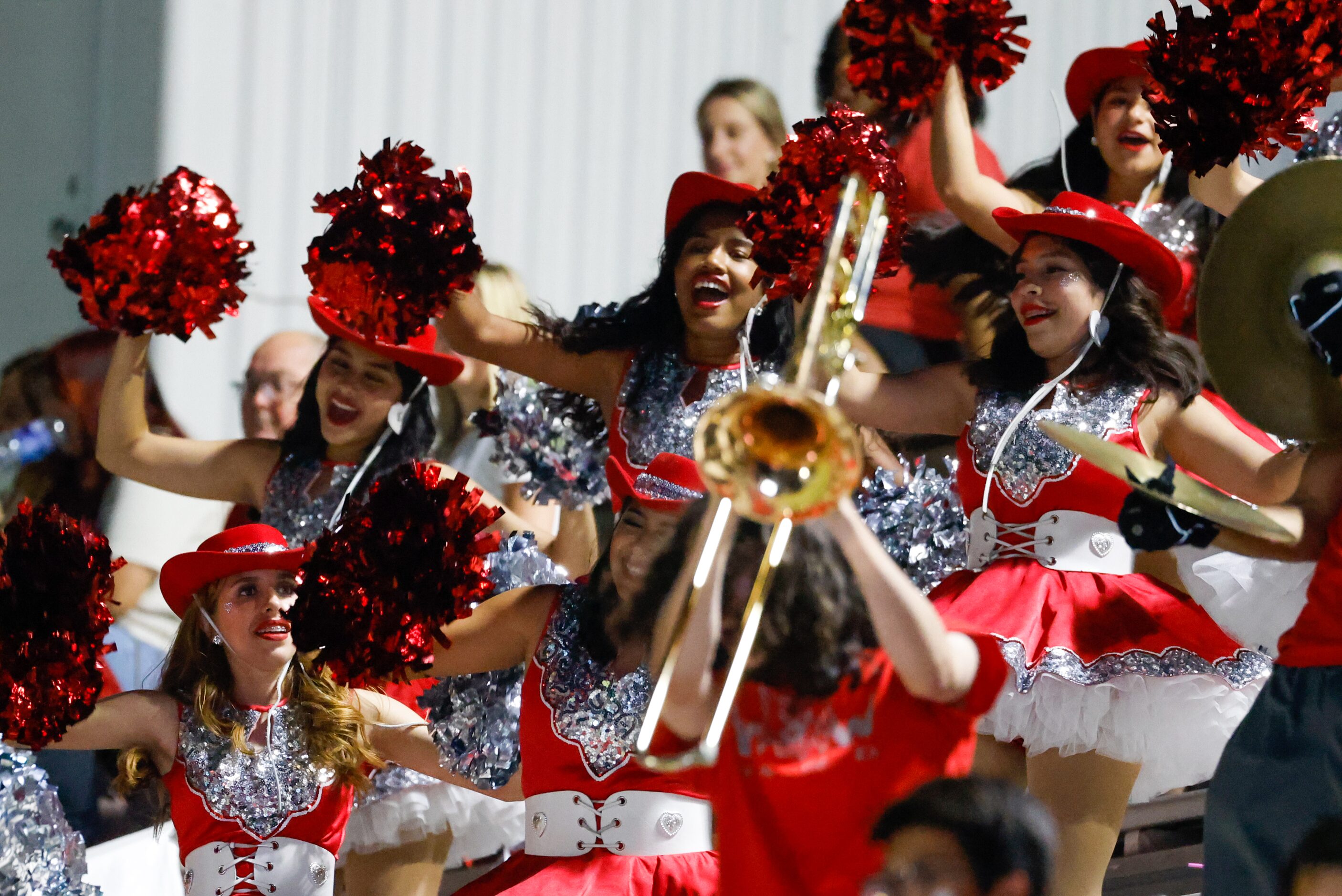 Woodrow Wilson students cheer on their team as they continue their lead against Conrad at...