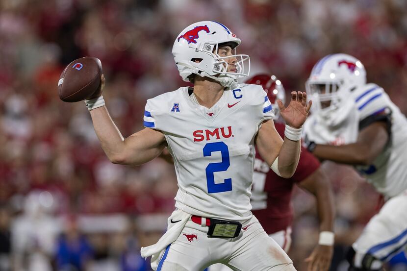 SMU quarterback Preston Stone throws a pass against Oklahoma during the second half of an...