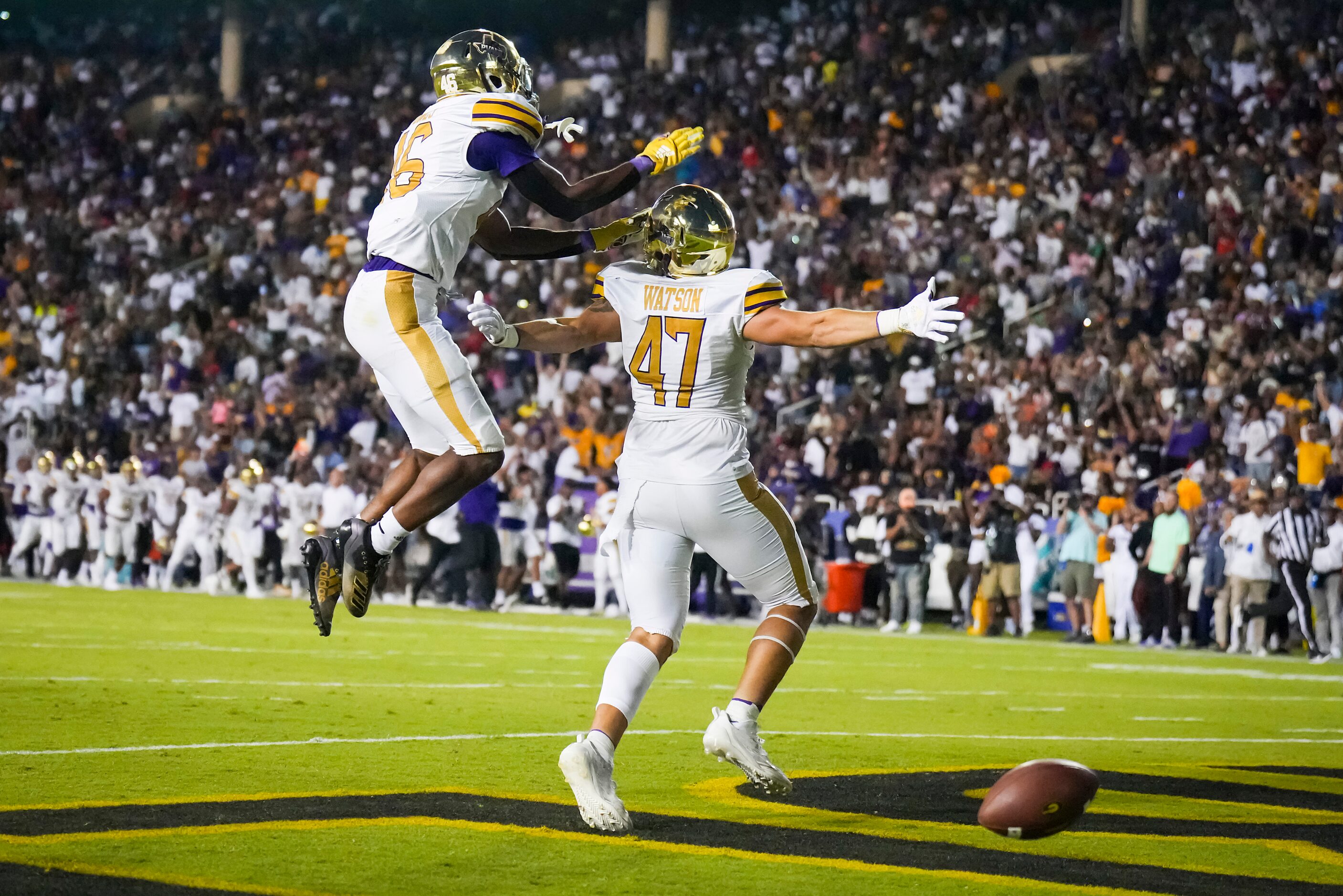 Prairie View defensive end Xxavier Watson (47) celebrates with linebacker Kenden Jones (46)...