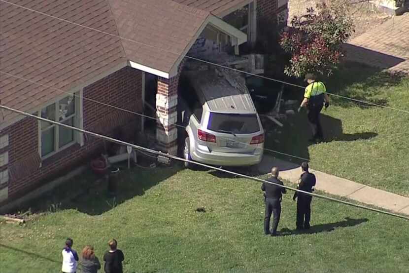 The SUV wound up crashing into a house on Meadowbrook Drive in Fort Worth on Tuesday, March...