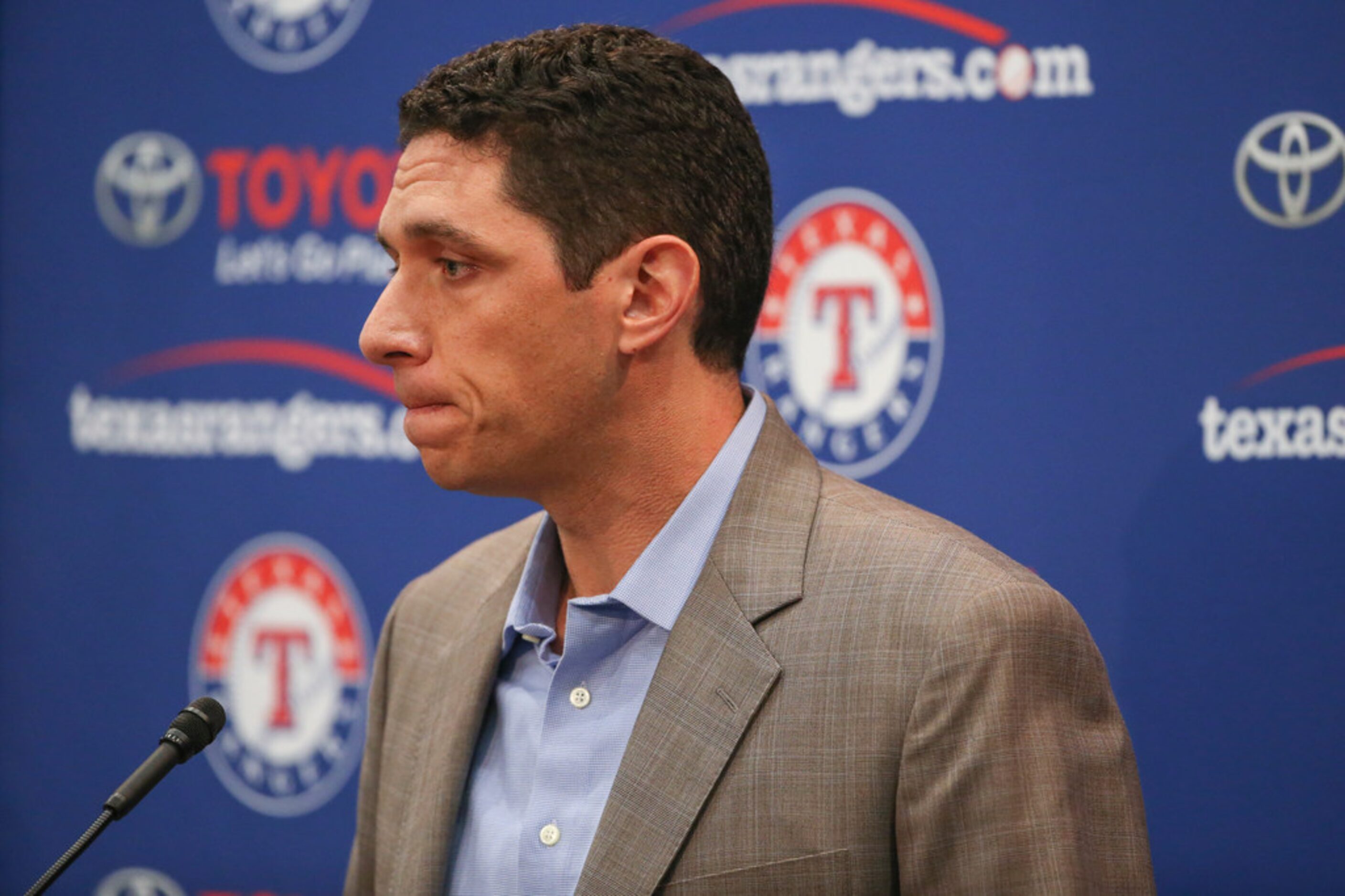 Rangers President of Baseball Operations and General Manager Jon Daniels addresses members...