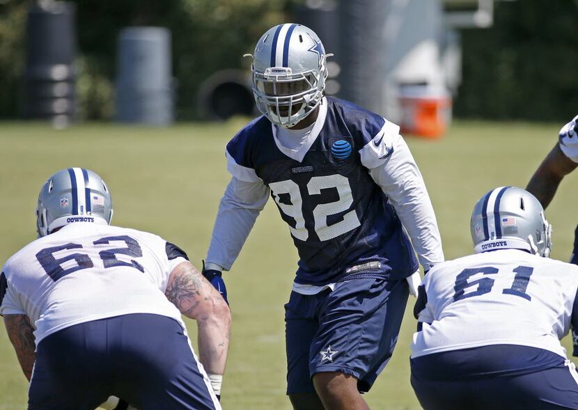 Dallas Cowboys defensive line Cedric Thornton (92) practices with Ryan Mack (61) and Jared...