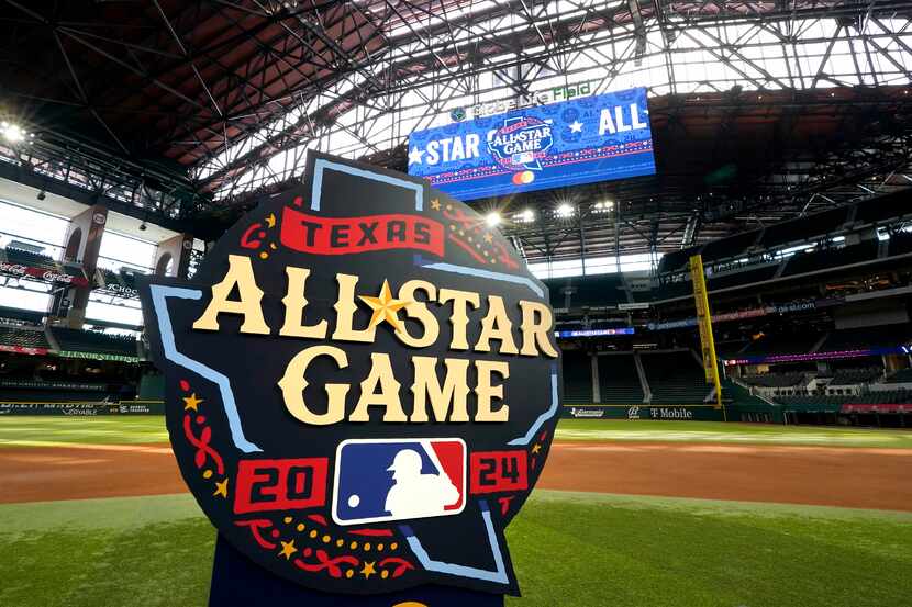 The logo for the 2024 Major League Baseball All-Star game logo sits on infield at Globe Life...