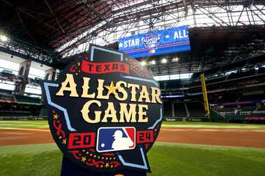 The logo for the 2024 Major League Baseball All-Star game logo sits on infield at Globe Life...