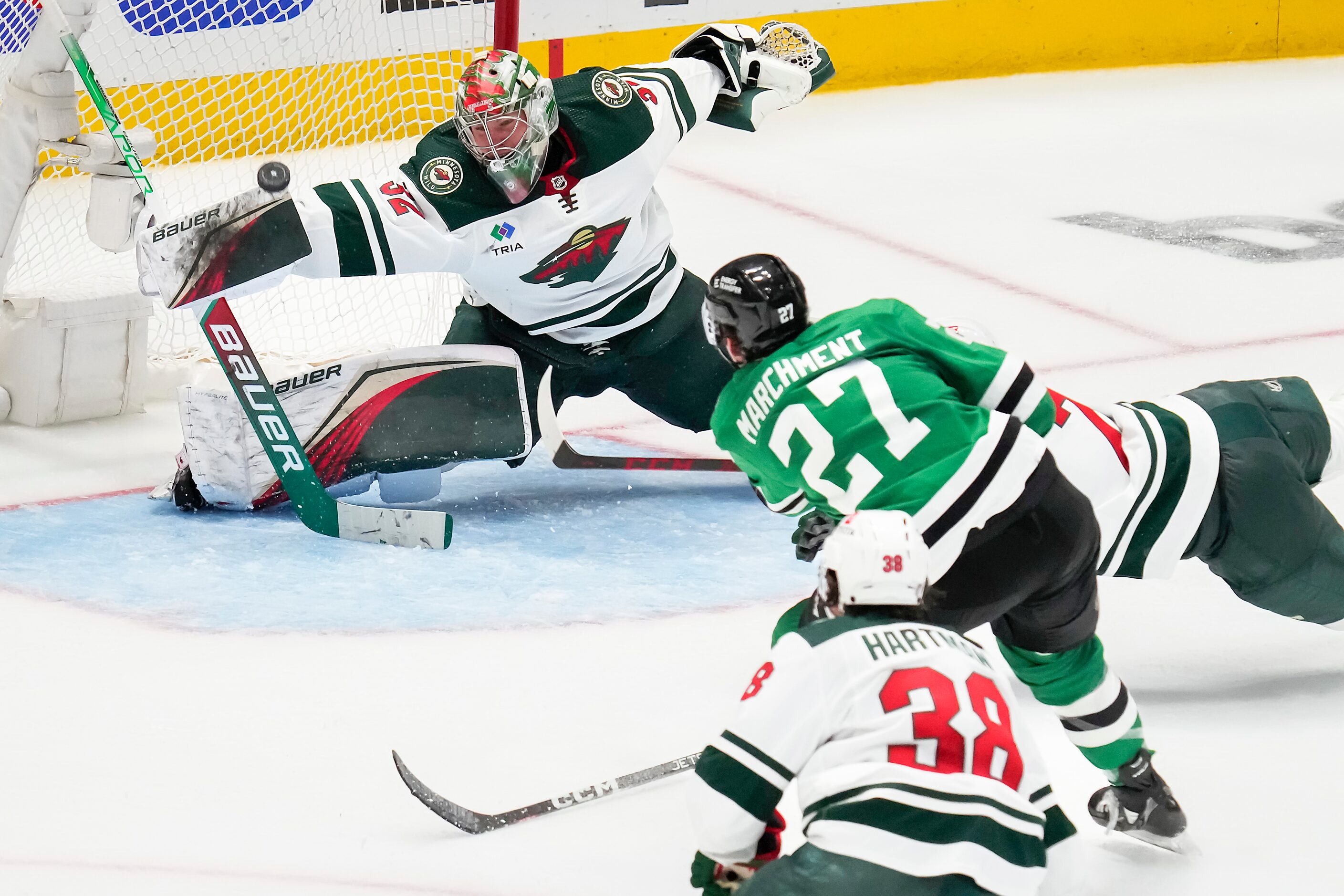 Minnesota Wild goaltender Filip Gustavsson (32) makes a save against Dallas Stars left wing...