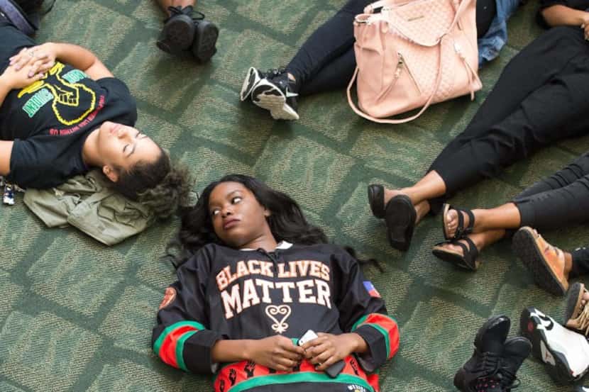 Students took part in a lie-in at the University of North Carolina in Charlotte on Wednesday...