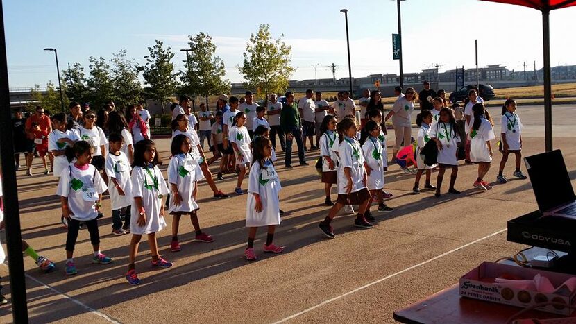 
Youth warming up for the Aga Khan Foundation Walk/Run at the Irving Convention Center.
