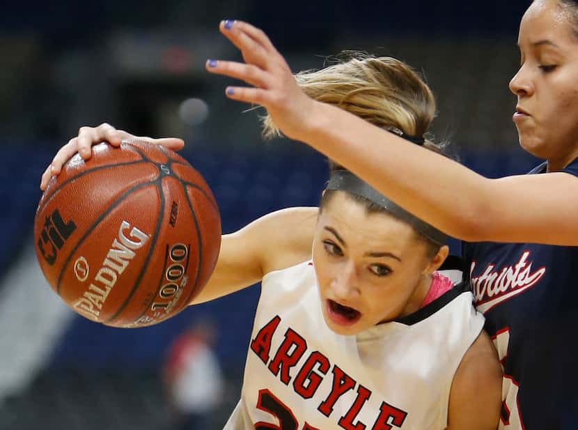 Argyle's Sydney Standifer drives toward the basket in the Class 4A state championship game...