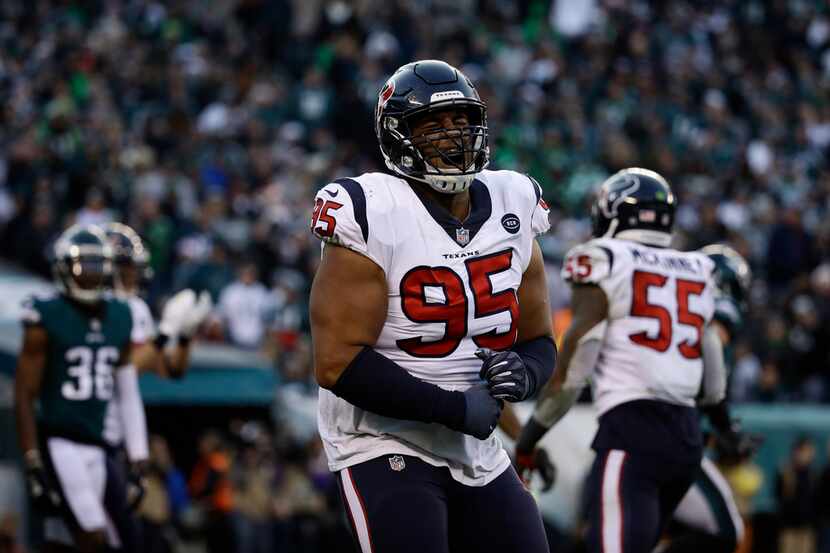 FILE - Houston Texans' Christian Covington reacts during the second half of an NFL football...