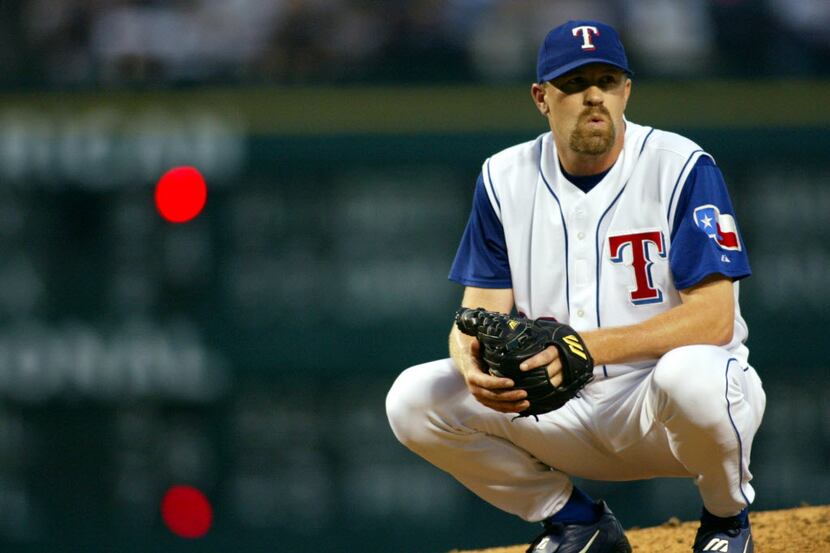 Texas Rangers relief pitcher Doug Brocail reacts after hitting New York base runner Miguel...