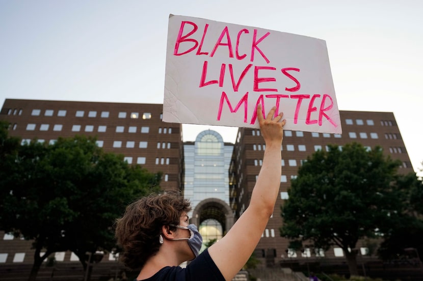 Demonstrators rally outside the Frank Crowley Courts Building during the Not My Son...