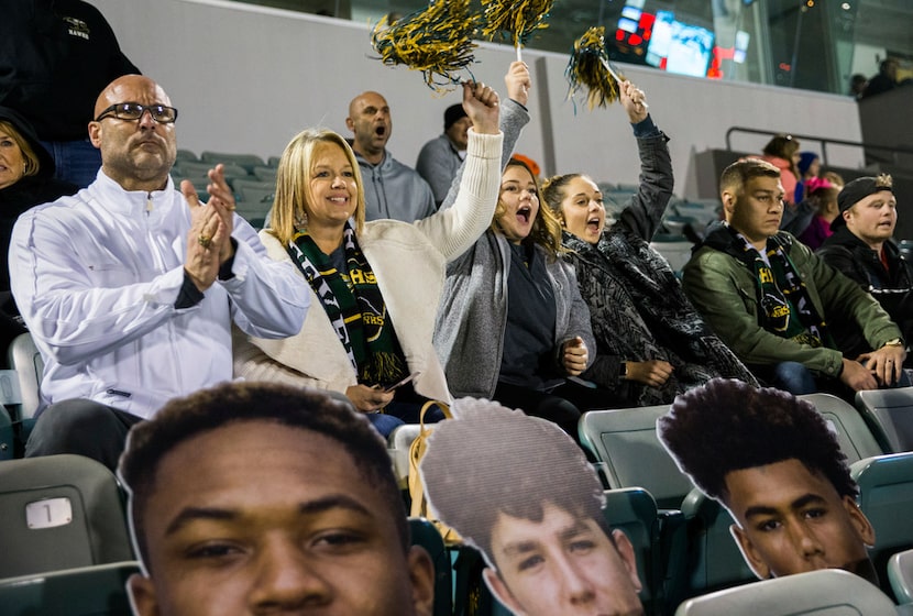 From left, John Earle, Josie Earle, Ali Earle, Alexis Arosemena and Jonathan Arosemena cheer...