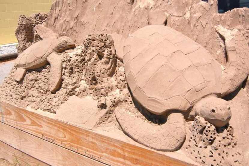 
Fred Mallett of Port Aransas sculpted sea turtles in front of Sea Turtle Inc., the island’s...