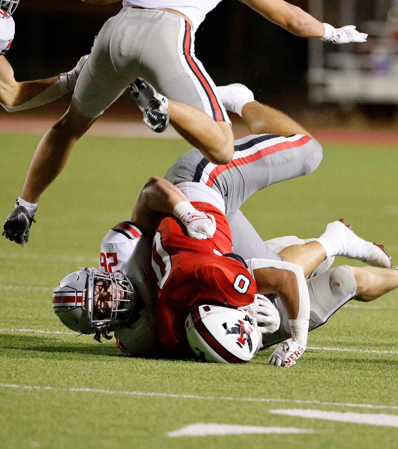 Lovejoy's Payton Pierce (26) tackles Argyle's Devon Owen (0) as Lovejoy's RJ McIntosh (2),...