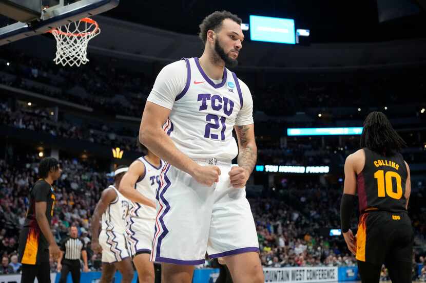 TCU forward JaKobe Coles reacts after drawing a foul during the second half of the team's...