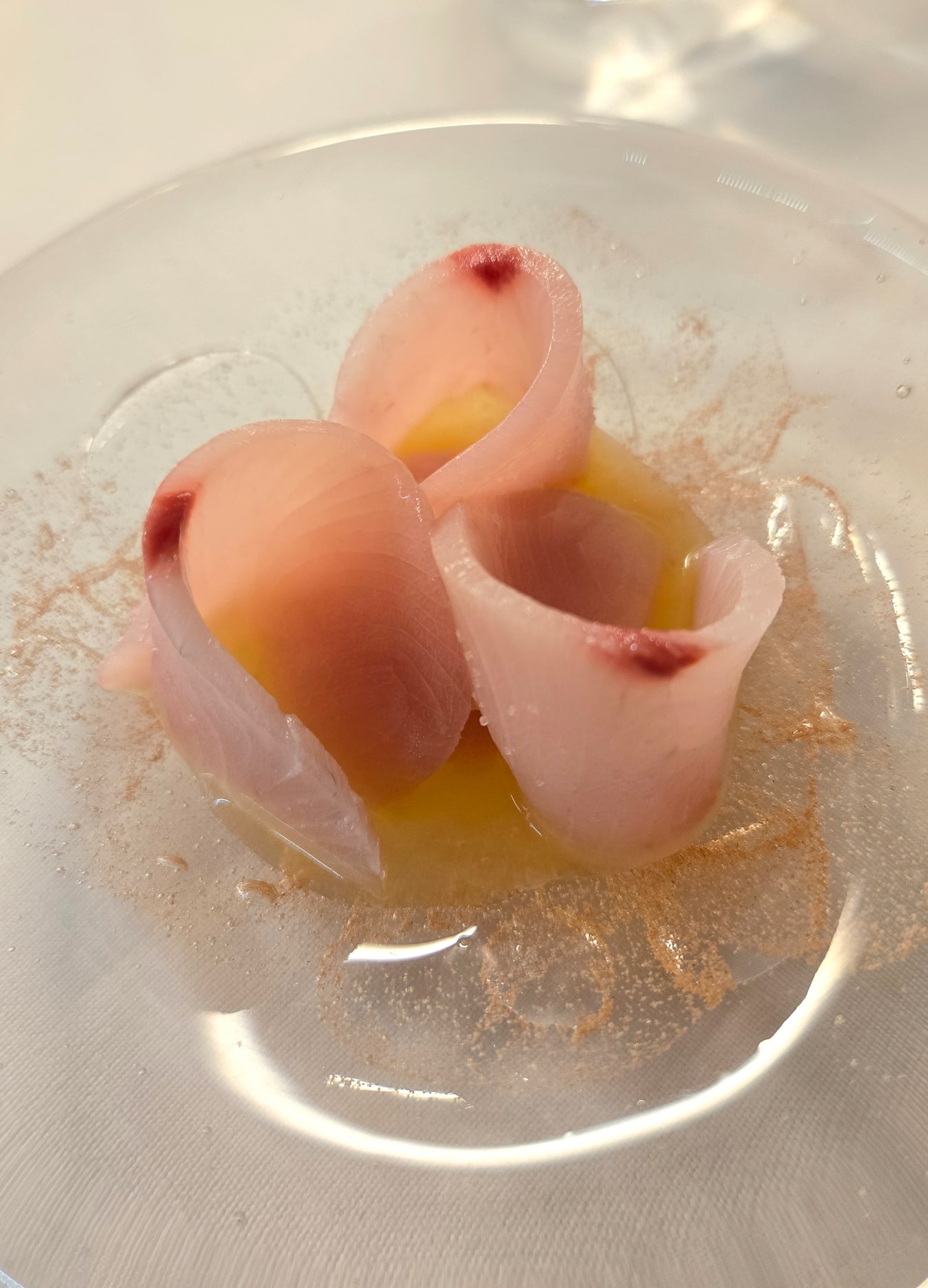 3-star Michelin restaurant Jordnær serves hamachi with ponzu and wasabi for one course....