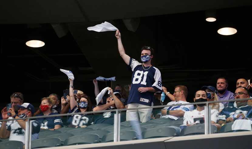 Dallas Cowboys fans cheer before kickoff against the Atlanta Falcons in the home opener at...
