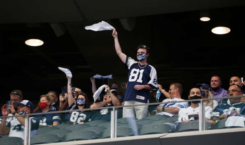 Dallas Cowboys fans cheer before kickoff against the Atlanta Falcons in the home opener at...