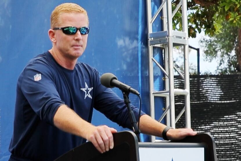 Dallas Cowboys head coach Jason Garrett at the podium during his press conference a day...