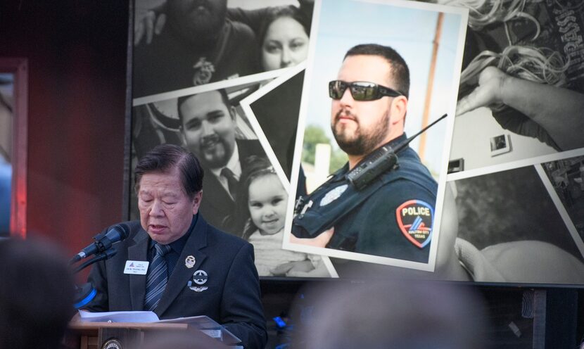 Against a background of photos depicting the life of Haltom City police Officer Kris...