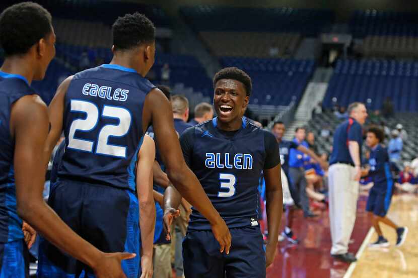 Allen's Isaiah Stevens celebrates after coming out the Class 6A boys basketball UIL state...
