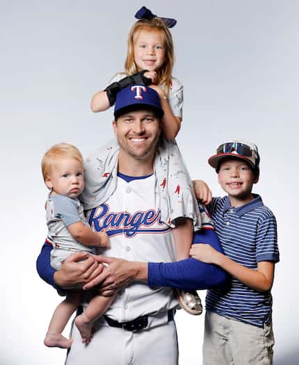 Texas Rangers Jacob deGrom his children, (from left) Nolan, Aniston and Jaxon, at Globe Life...