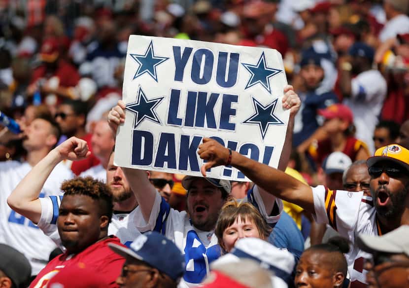 Dallas Cowboys fans and Washington Redskins fans during the first half of play at FedEx...