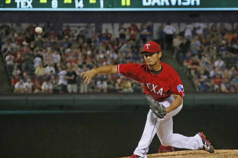 Texas pitcher Yu Darvish pitches in the ninth inning of his near- no-hitter during the...