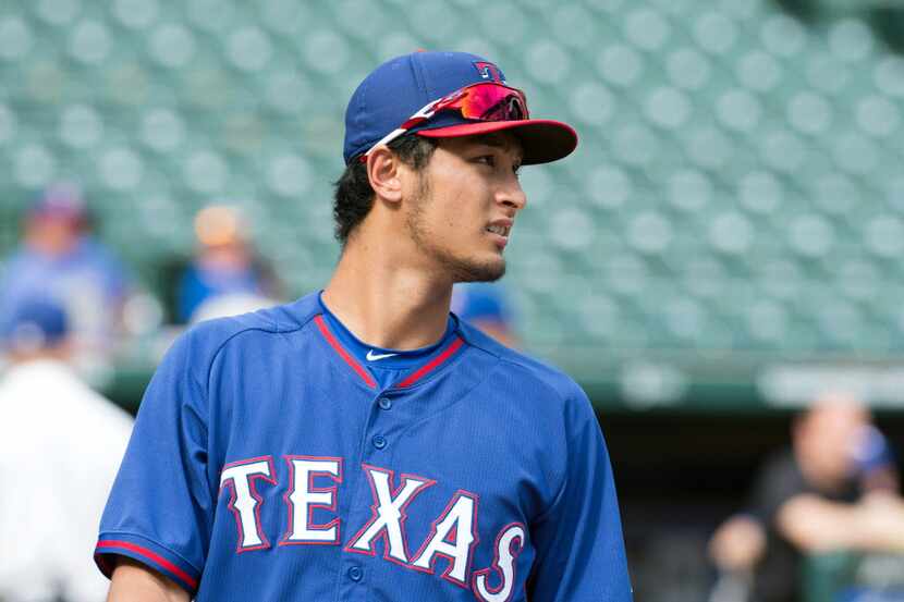 May 17, 2014; Arlington, TX, USA; Texas Rangers starting pitcher Yu Darvish (11) during...