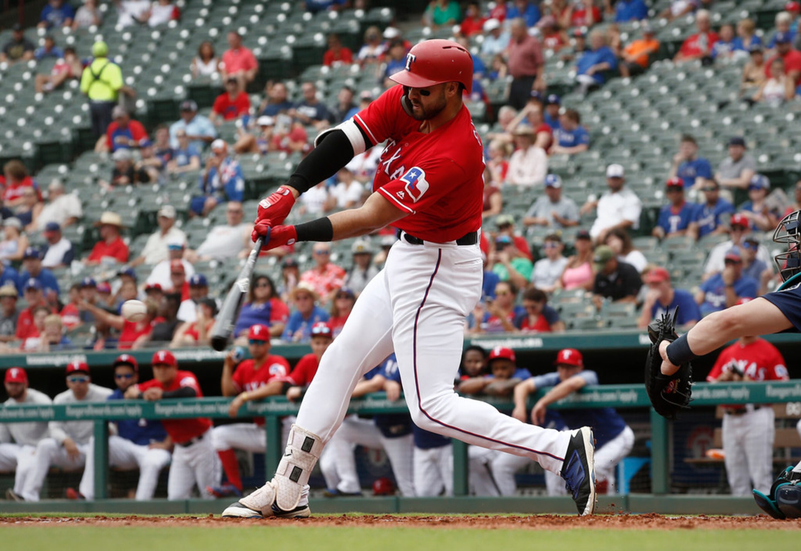 Texas Rangers Joey Gallo drives in a run against the Seattle Mariners during the first...