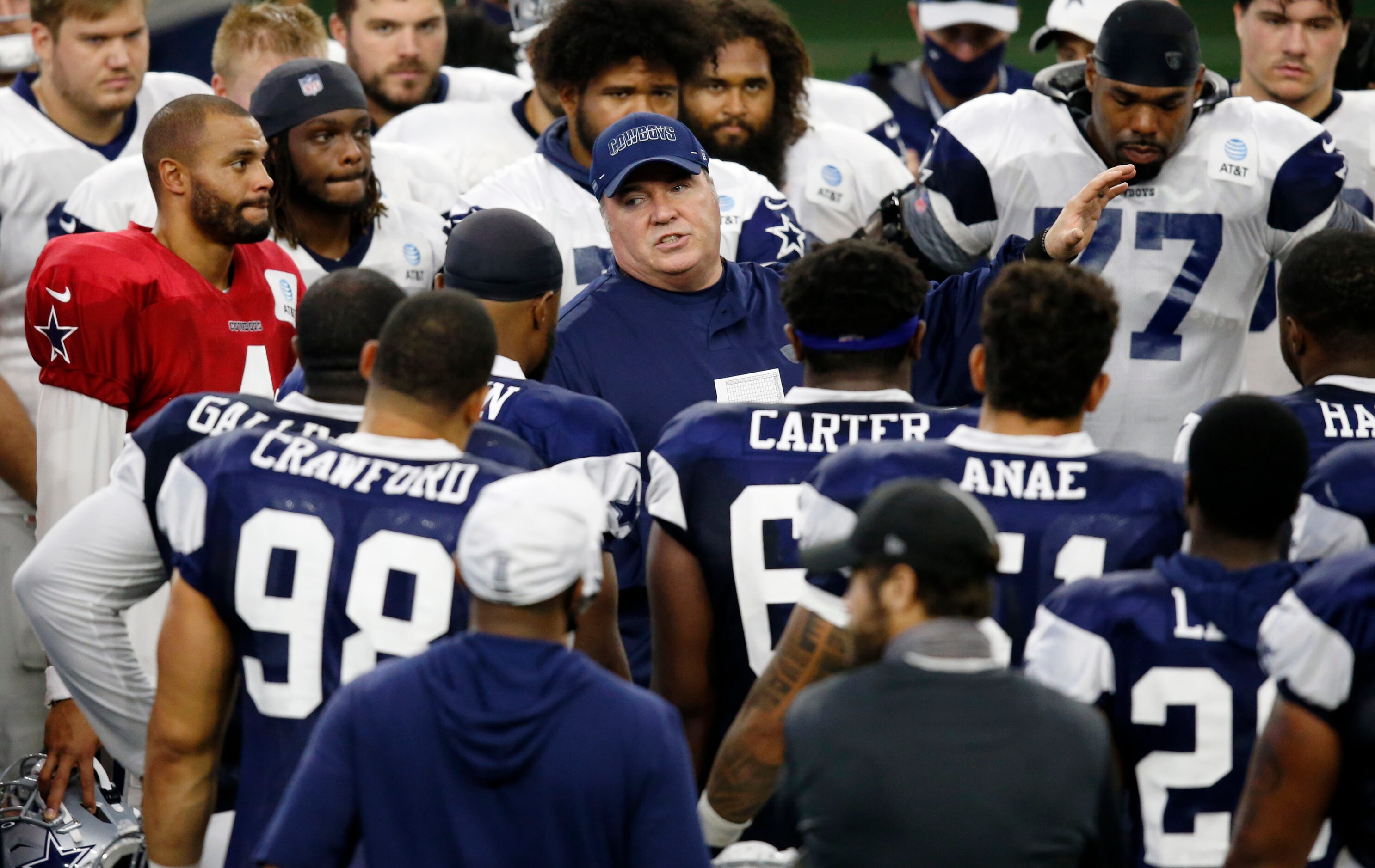 Dallas Cowboys head coach Mike McCarthy talks to the team after practice during training...