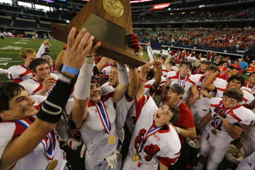 Wellington celebrates after defeating Falls City winning the  Class 1A Division II state final.